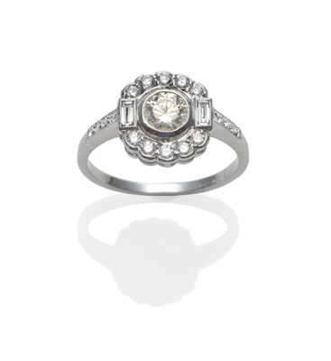 Lot 213 - An Art Deco Style Diamond Cluster Ring, a round brilliant cut diamond centrally, spaced to a border