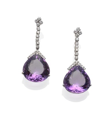 Lot 218 - A Pair Of 18 Carat White Gold Amethyst And Diamond Drop Earrings, a quatrefoil round brilliant...