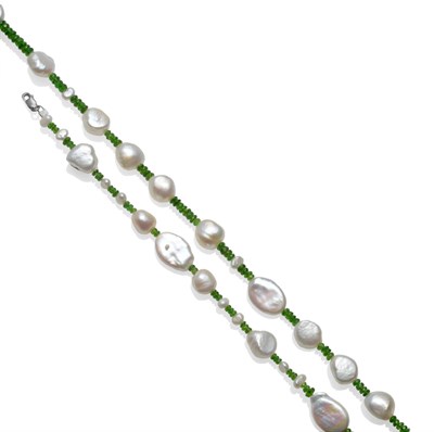 Lot 228 - A Diopside and Cultured Pearl Necklace and Bracelet Set, the faceted diopside beads set with...