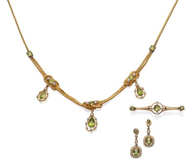 Lot 232 - An Early 20th Century Peridot and Seed Pearl Necklace, a foxtail link chain with double chain...