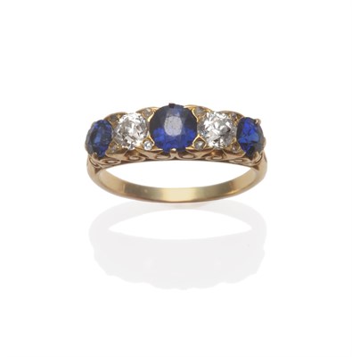 Lot 236 - A Victorian Sapphire and Diamond Five Stone Ring, three graduated round mixed cut sapphires...