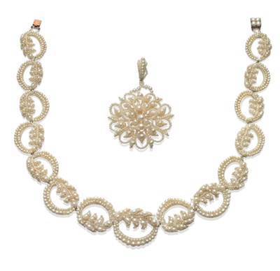 Lot 242 - A Seed Pearl Necklace, circa 1850, comprising graduated oval loops with foliate motifs, on...