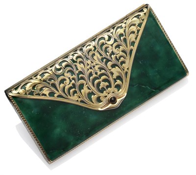 Lot 252 - An Art Deco Silver Gilt Cosmetic Case, the green oblong body with pierced foliate mount and...