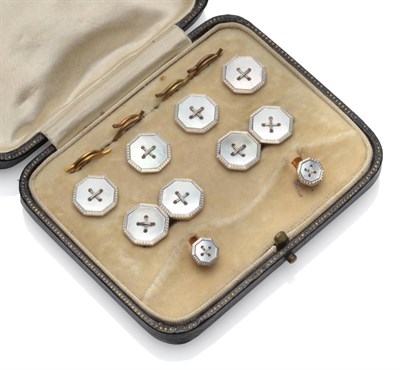 Lot 281 - A Mother-of-Pearl Dress Stud Set, the octagonal mother-of-pearl within white engine turned borders