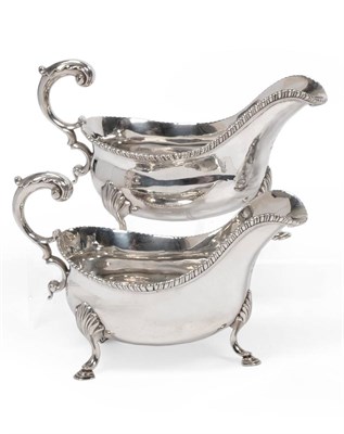 Lot 322 - A Pair of George III Silver Sauce Boats, probably Samuel Smith, London 1771, of typical form with a