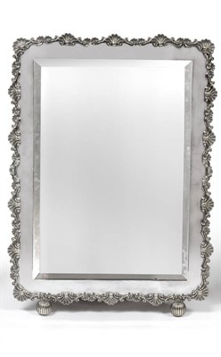 Lot 331 - A Silver Plated Toilet Mirror, apparently unmarked, the large rectangular frame with a rocaille...