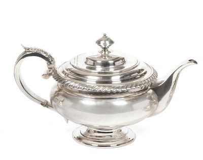 Lot 336 - A George IV Scottish Silver Teapot, Charles Bendy, Edinburgh 1821, of compressed melon form...