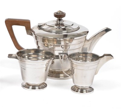 Lot 343 - An Art Deco Silver Three Piece Tea Service, Walker & Hall, Sheffield 1945, comprising teapot,...