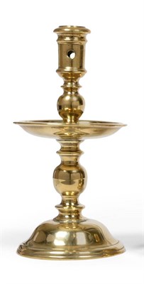 Lot 373 - An Early 17th Century Brass Heemskerk Candlestick, the low domed foot rising to a drip tray between