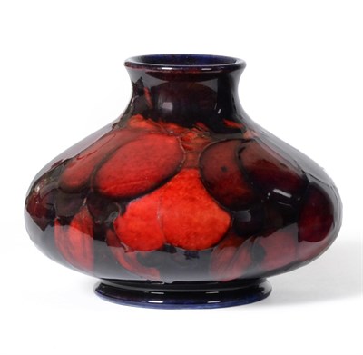 Lot 388 - A William Moorcroft Flambé Wisteria Pattern Squat Vase, circa 1928, impressed factory marks...