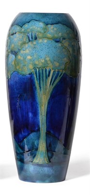 Lot 389 - A William Moorcroft Moonlit Blue Landscape Pattern Vase, circa 1925, green painted signature,...