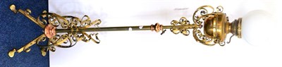 Lot 447 - An Arts & Crafts Benham & Froud Brass and Copper Telescopic Standard Lamp, with scroll work...