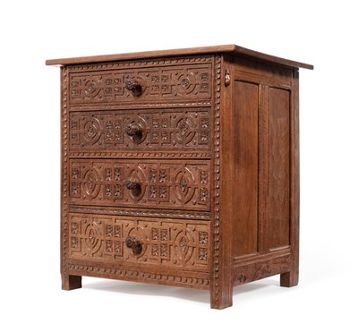 Lot 457 - A 1930's Robert  "Mouseman " Thompson Panelled Oak Chest of Drawers, the rectangular...