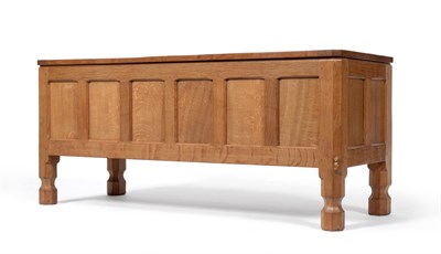 Lot 474 - A Robert  "Mouseman " Thompson Panelled Oak Blanket Box, on four octagonal and block feet, with...