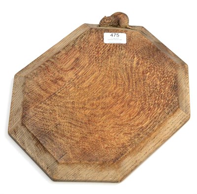 Lot 475 - A 1950's Robert  "Mouseman " Thompson Oak Bread Board, with carved mouse signature, 31cm