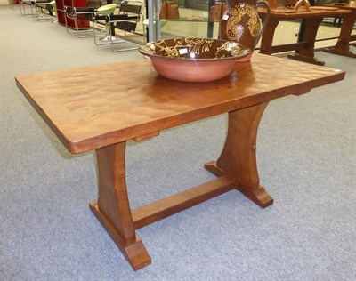 Lot 487 - A Robert  "Mouseman " Thompson Oak 4'3 " Refectory/Pub Table, on two octagonal legs joined by a...