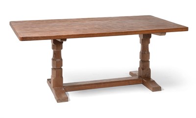 Lot 491 - A Robert  "Mouseman " Thompson Oak 6' Refectory Table, on two octagonal legs joined by a...