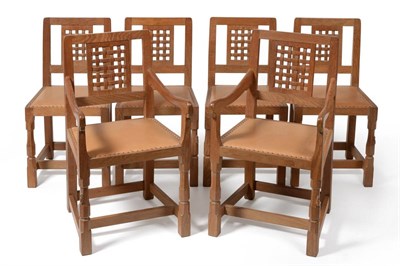 Lot 492 - A Set of Six (4+2) Robert  "Mouseman " Thompson Oak Lattice Back Dining Chairs, with cow hide...