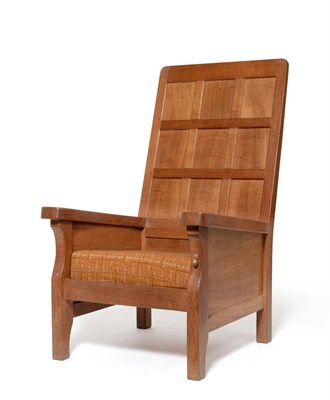 Lot 493 - A Robert  "Mouseman " Thompson Oak Smoker's Chair, with panelled back, shaped arm rests, with...