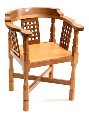 Lot 495 - A Robert  "Mouseman " Thompson Oak Monk's Chair, with curved back and shaped arms, over three...