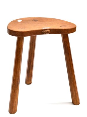 Lot 500 - A Robert  "Mouseman " Thompson Oak Cow Stool, on three octagonal legs, with carved mouse signature