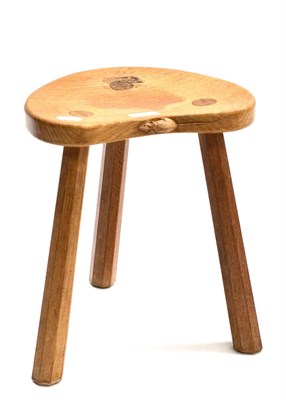 Lot 501 - A Robert  "Mouseman " Thompson Oak Calf Stool, on three octagonal legs, with carved mouse...