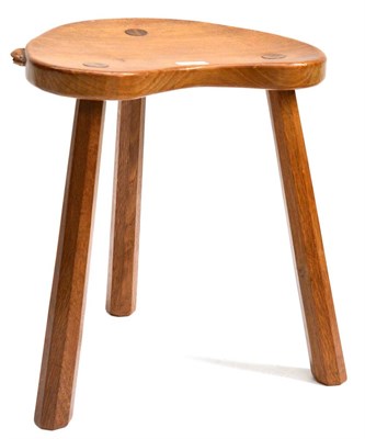 Lot 508 - A Robert  "Mouseman " Thompson Oak Kidney Cow Stool, on three tapered octagonal legs, with...