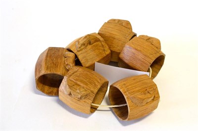 Lot 519 - Six Robert  "Mouseman " Thompson Oak Napkin Rings, of octagonal form, each with carved mouse...