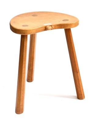 Lot 520 - A Robert  "Mouseman " Thompson Oak Kidney Cow Stool, on three tapered octagonal legs, with...