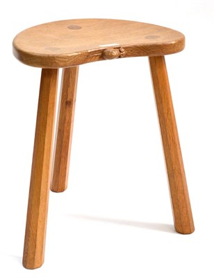 Lot 521 - A Robert  "Mouseman " Thompson Oak Kidney Cow Stool, on three tapered octagonal legs, with...