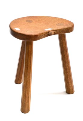 Lot 537 - A Robert  "Mouseman " Thompson Oak Calf Stool, on three octagonal legs, with carved mouse...