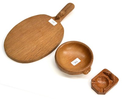 Lot 538 - A Robert  "Mouseman " Thompson Oak Cheese Board, with carved mouse signature on the handle, 38.5cm