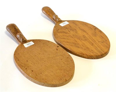 Lot 543 - Two Robert  "Mouseman " Thompson Oak Cheese Boards, each with carved mouse signature on the handle