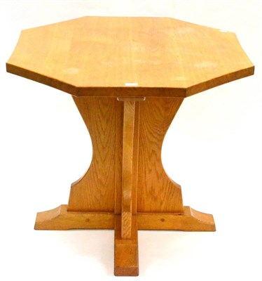 Lot 556 - A Sid Pollard of Thirsk Oak Octagonal Table, on a cruciform base, unmarked, 95cm diameter,...