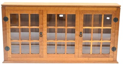 Lot 558 - A Sid Pollard of Thirsk Glazed Oak Wall Display Cabinet, with two doors and a fixed central...