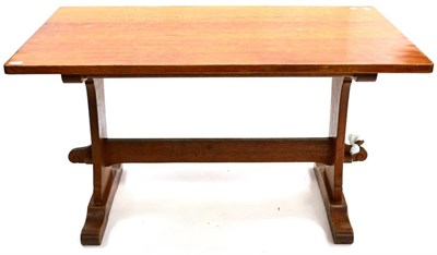 Lot 562 - A Bob  "Wrenman " Hunter Oak Refectory Table, on two shaped supports joined by a stretcher,...