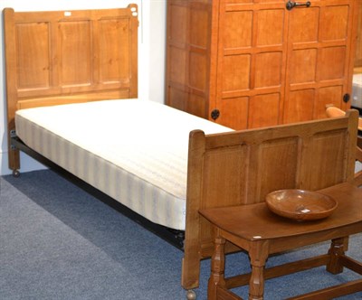 Lot 570 - A Pair of Colin  "Beaverman " Almack Oak 3ft Single Bedsteads, with metal side rails, each with...