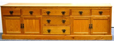 Lot 574 - A Nigel  "Woodworm " Dixon Oak Sideboard, the rectangular top above a central section of three...