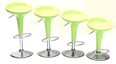 Lot 592 - A Set of Four Magis Bombo Bar Stools, designed by Stefano Giovannoni, green ABS plastic seat, steel