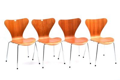 Lot 597 - A Set of Four Fritz Hansen Series 7 Chairs, designed by Arne Jacobsen, pressure moulded veneer...