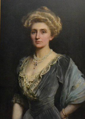 Lot 703 - Attributed to Harrington Mann (1864-1937) Portrait of an elegant lady, half length, wearing a pearl