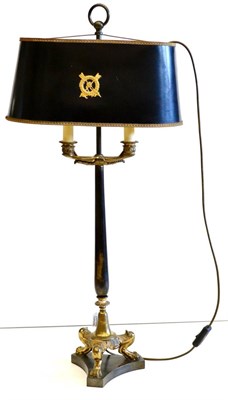 Lot 804 - A Regency Style Gilt Metal Twin-Branch Bouillote Lamp, with painted oval shade below a brass...