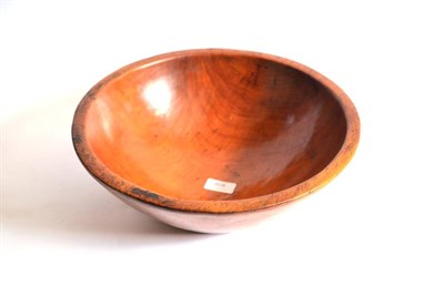 Lot 808 - An 18th Century Yewwood Dairy Bowl, of shallow U form, plain circular outline, dark honey...