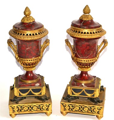 Lot 817 - A Pair of French Ormolu and Rouge Marble Urns and Covers, 1st half 19th century, with pineapple...