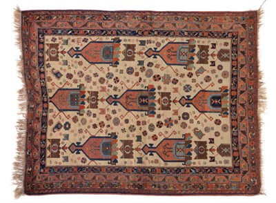 Lot 836 - Unusual Afshar Rug South East Persia The ivory field of heraldic devices enclosed by coral pink...