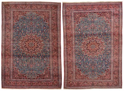 Lot 844 - Pair of Finely Woven Isfahan Rugs Central Persia Each with a powder blue field of scrolling...