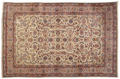 Lot 854 - Kashan Carpet Central Persia The ivory field with an allover design of scrolling leaves enclosed by