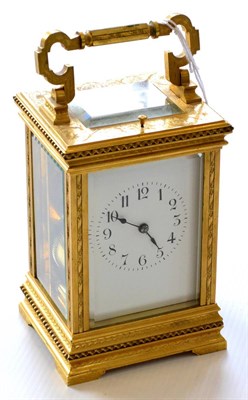 Lot 868 - A Gilt Brass Striking and Repeating Carriage Clock, circa 1900, engraved case with carrying...