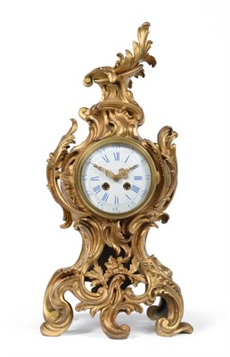 Lot 874 - A Gilt Bronze Striking Mantel Clock, circa 1890, scroll decorated case, 5-inch enamel dial with...