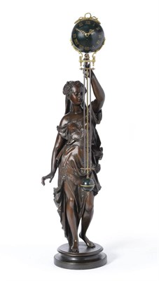 Lot 886 - A Large Bronzed Spelter Swinging Mystery Timepiece, circa 1900, case depicting a classical lady...